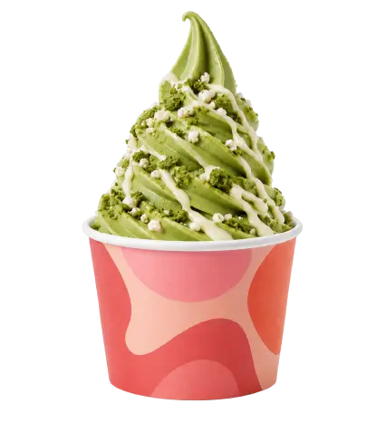 Helado soft serve de pistacho con salsa de chocolate blanco
